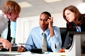 coworkers arguing at table